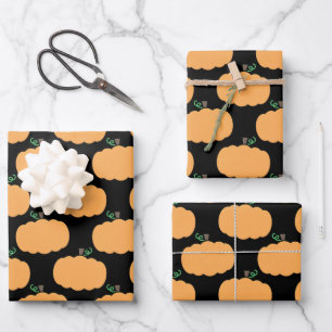 Feuille De Papier Cadeau Motif de citrouille sur fond noir