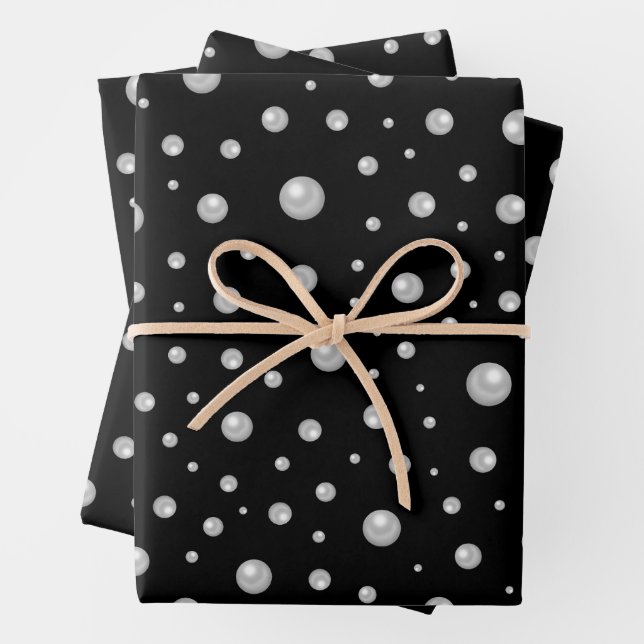 Feuille De Papier Cadeau Motif de perle sur fond noir (En situation)
