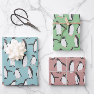 Feuille De Papier Cadeau Pingouins dans le motif de neige