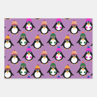 Feuille De Papier Cadeau Pingouins mignons aux casquettes d'hiver