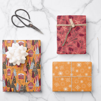 Feuille De Papier Cadeau Village de Noël rouge et orange en forêt