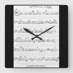 Feuille manuscrite carré de musique horloge murale
