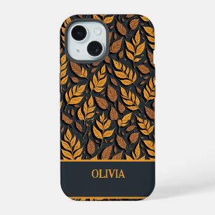 Feuilles d'automne orange sur fond marron