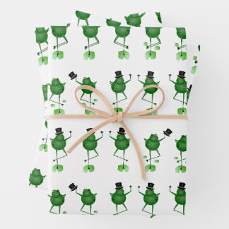 Feuilles de papier enveloppant des grenouilles dan