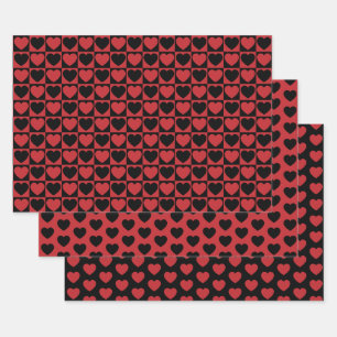 Feuilles de papier enveloppant le coeur noir et ro