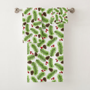 Feuilles de pin de Noël, cônes et baies sur blanc
