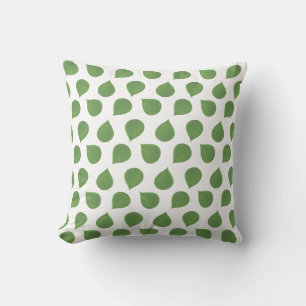 Feuilles vertes d'arbre de jade sur un coussin jet
