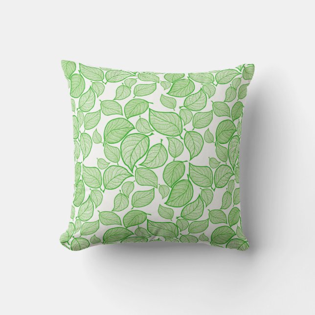 Feuilles verts sur oreiller blanc (Recto)
