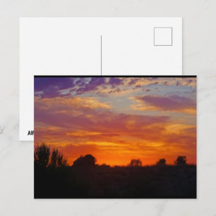 Feurige Sonnenuntergangslandschaft Postkarte