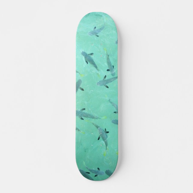 Fidschi-Fische schwimmen in blauem, klarem Wasser- Skateboard (Vorne)