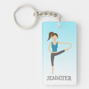 Fille de yoga en pose étendue de la main au pied e