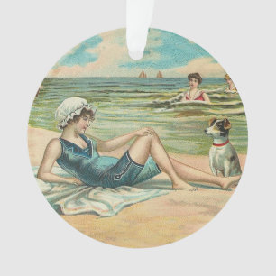 Fille et chien victoriens vintage au bord de la me