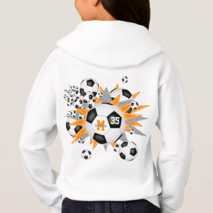 filles ballon de football souffle avec orange gris