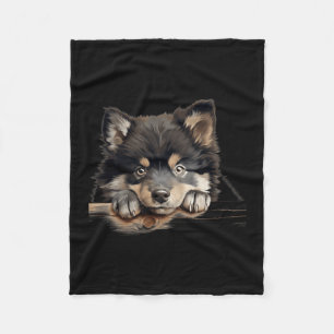 Finnischer Lapphund Hund Mama Papa spähender Welpe Fleecedecke