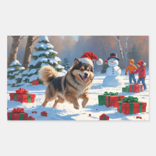 Finnischer Lapphund läuft durch Schnee mit Weihnac Rechteckiger Aufkleber