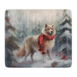 Finnischer Lapplandhund im Schnee Weihnachten  Schneidebrett