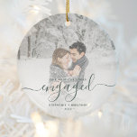 First Christmas Engaged Custom Photo Green Script Keramik Ornament<br><div class="desc">Commemorate your engagement with this beautiful modern keepsake ornament. The dark pine needle green text reads "Our first Christmas engaged, " with the word "engaged" in elegant handwriting script with flourishes before and after. Replace the sample image with your favorite photo, and add your names and the year. A white...</div>