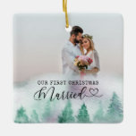First Christmas Married Winter Forest 2 Foto Keramikornament<br><div class="desc">Create your own Double Sided Foto ornament with watercolor winter forest border. The wording reads "our first christmas married" in typewriter text and elegant calligraphy with a love heart. The foto template is set up for you to add 2 Fotos - one each side. You can also add your names...</div>