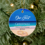 First Christmas Name Date Tropical Beach Keramik Ornament<br><div class="desc">Our first Christmas with paples name and date script ornament keepsake with white script on tropical beach background. Just add names and date on the front and a happy new year printed on the reverse. Just pick your style.</div>