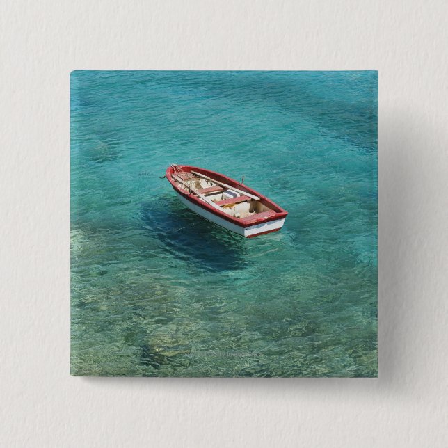 Fischerboot im klaren, bunten Wasser, Mani Button (Vorderseite)