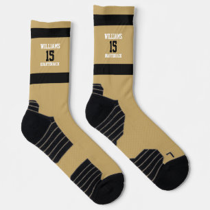Flache goldene und schwarze Crew Socken
