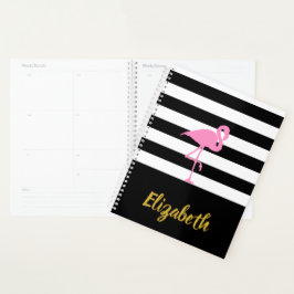 Flamant rose rose sur noir et blanc rayé