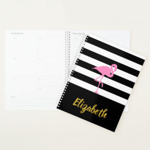 Flamant rose rose sur noir et blanc rayé