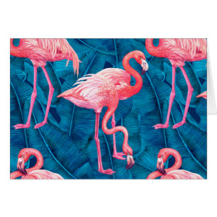 Flamants roses sur feuilles de bananes bleues