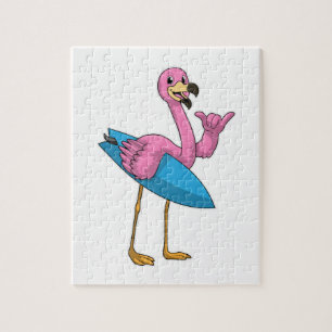 Flamingo als Surfer mit Surfbrett