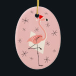 Flamingo Santa Pink Text Ornament Oval<br><div class="desc">Ein lebendiges, eigenartiges Weihnachtsdesign mit Retro-Touch mit einem rosa Flamingo mit Weihnachtsmannmütze, geometrischen, cremefarbenen Formen und Sternen auf rosa (Farbveränderung) Hintergrund. Ein individuell anpassbares Design für Sie, um mit Ihrem eigenen Text, Bildern und Ideen zu personalisieren. Ein originales digitales Kunstbild von QuirkyChic.</div>