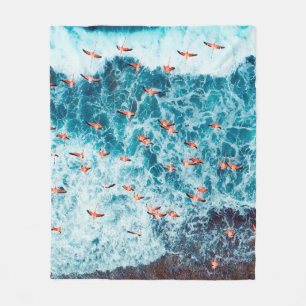 Flamingos flying on the beach of caribbean sea, Lo Fleecedecke