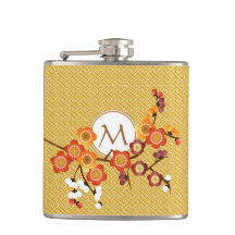 La prune japonaise fleurit rouge orange d'or