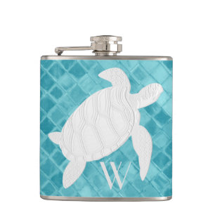 Flasques Tortue de mer sur le monogramme en verre de mer