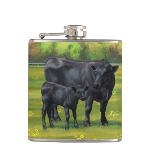 Flasques Vache d'Angus noir et veau mou en pâturage d'été