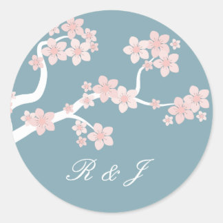 Fleur de cerisier sur autocollant bleu cercle