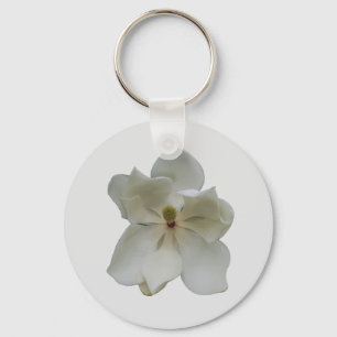 Fleur de magnolia blanche sur un porte-clés
