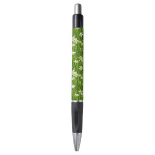 Fleurs blanches et stylo à encre noire Plante