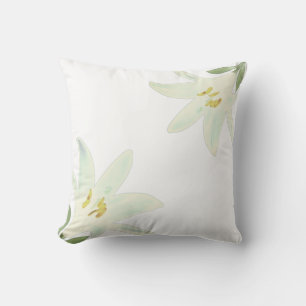 Fleurs d'Amaryllis sur un Coussin de Jeté Blanc