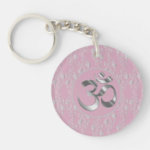 Fleurs d'argent sur le symbole OM rose