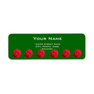 fleurs de camélia rouges étiquette d'adresse verte