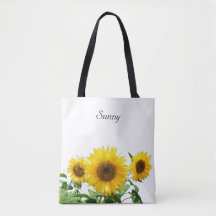 Fleurs de soleil sur le sac fourre-tout blanc