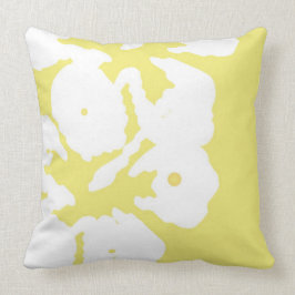 Fleurs d'Hibiscus blancs sur oreiller jaune