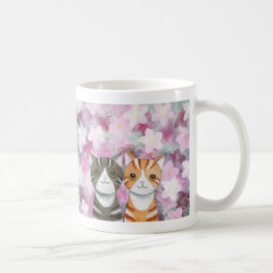 Fleurs mignonnes de chats tigrés de tasse de