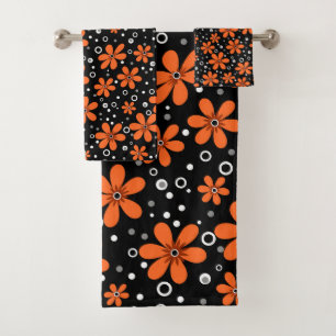 Fleurs orange vif sur un arrière - plan noir avec