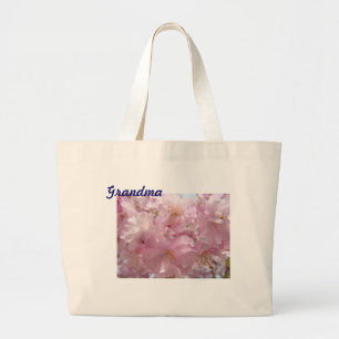 Fleurs roses de fleur d'arbre de cadeaux de sac