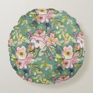 Fleurs roses sur coussin vert rond   Charme