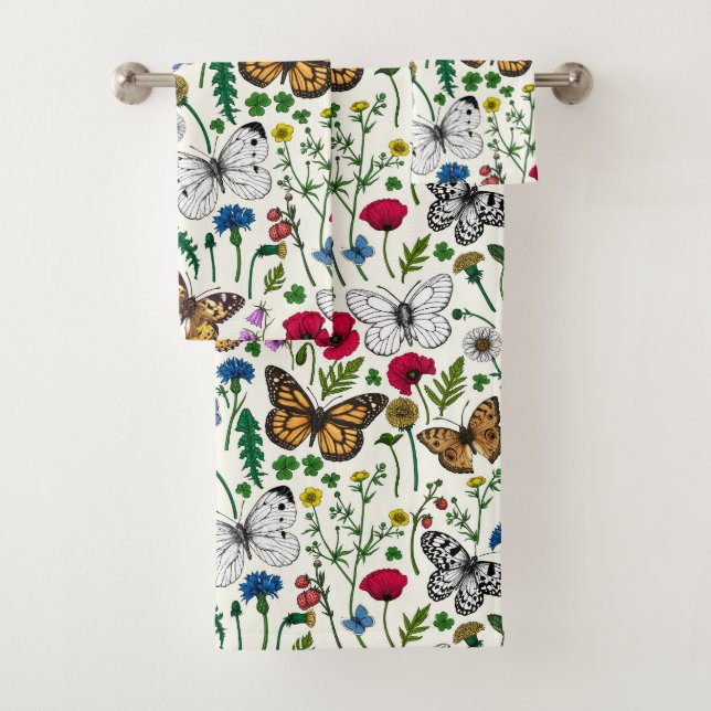 Fleurs sauvages et papillons sur blanc (En situation)