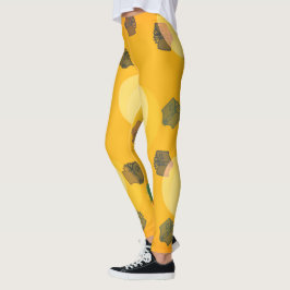Fliegende Bücher in goldenen Leggings