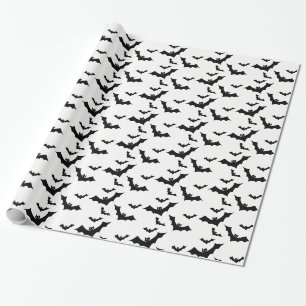 Fliegende schwarze Schläger auf weißem Hintergru Geschenkpapier