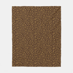 Fliesenhintergrund mit einem Leopardpelz Fleecedecke